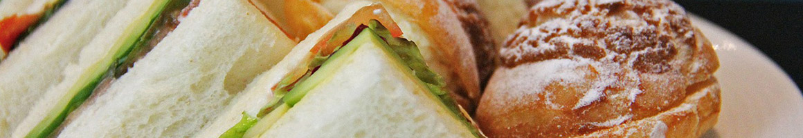 Eating Sandwich at DAD'S Sandwiches restaurant in Sacramento, CA.